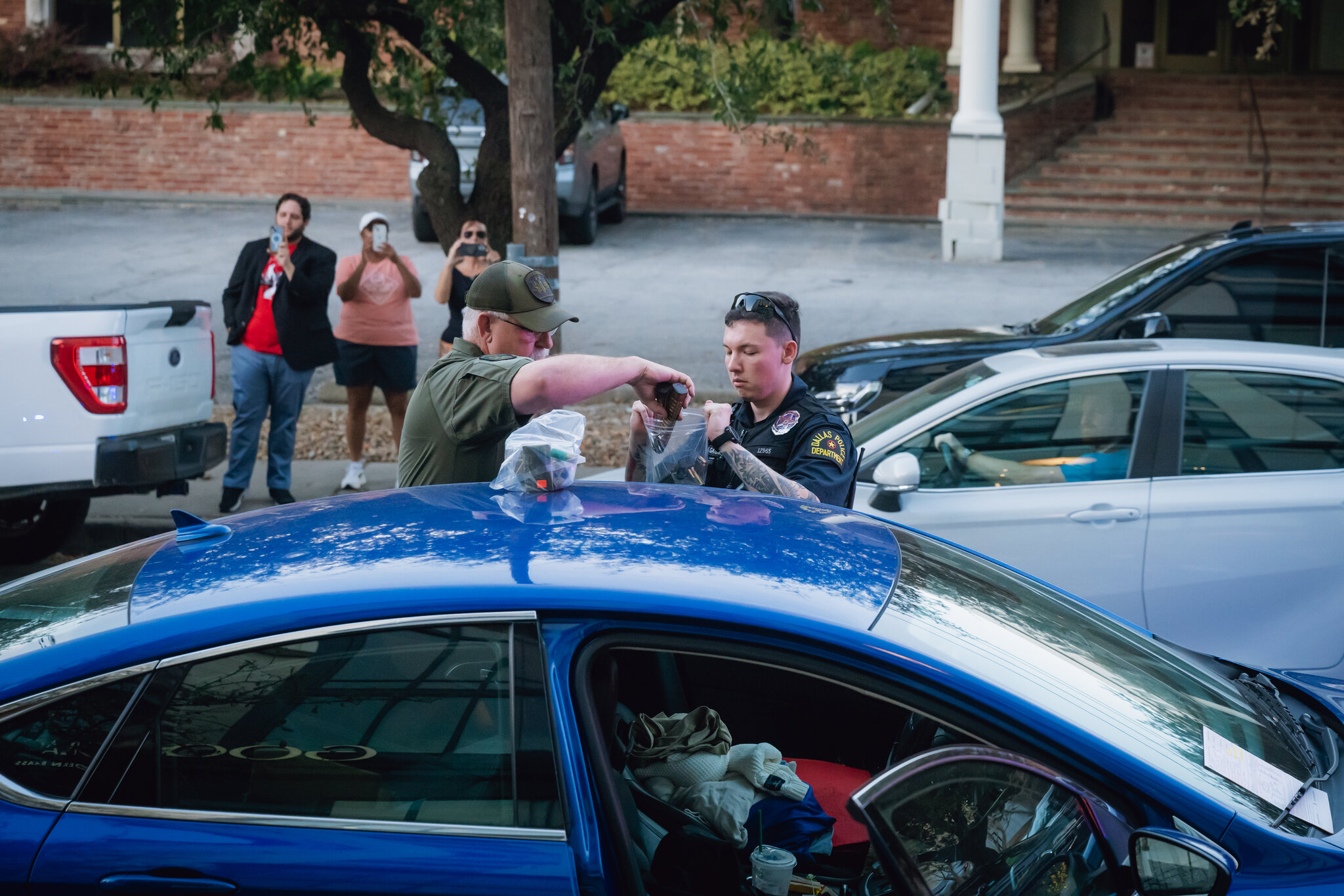 Police Arrest a Masked Man Outside Ken Paxton Watch Party
