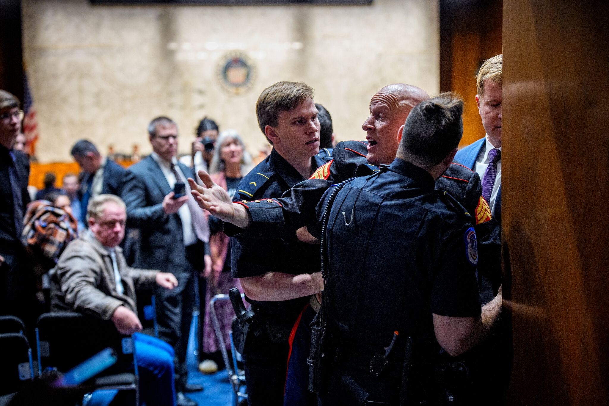 Senator Helps Officers Forcibly Remove Protesting Veteran From Hearing