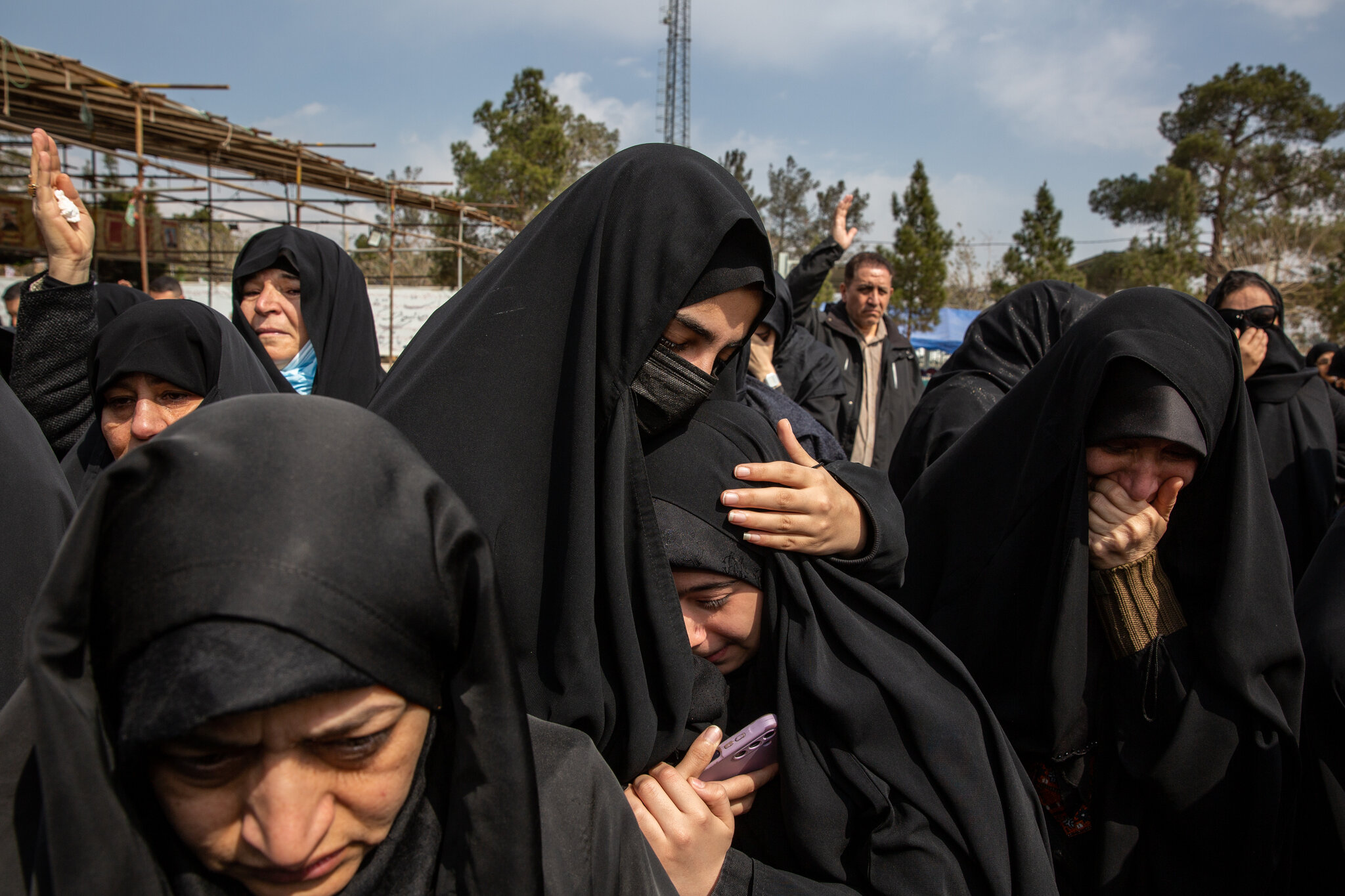 At a cemetery in Tehran, there are fresh graves and angry slogans.