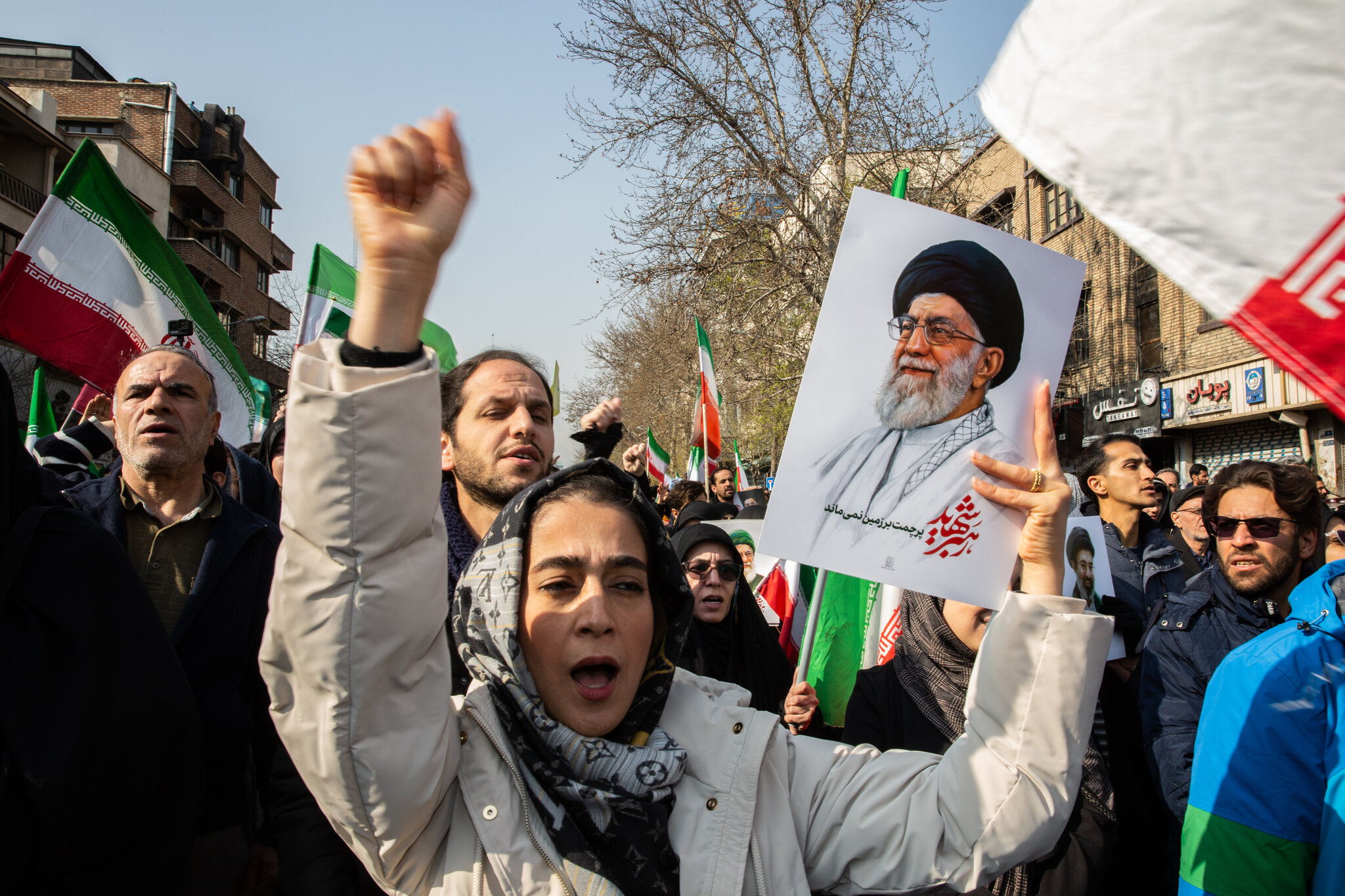 Iran holds a public mourning ceremony for commanders killed by strikes.