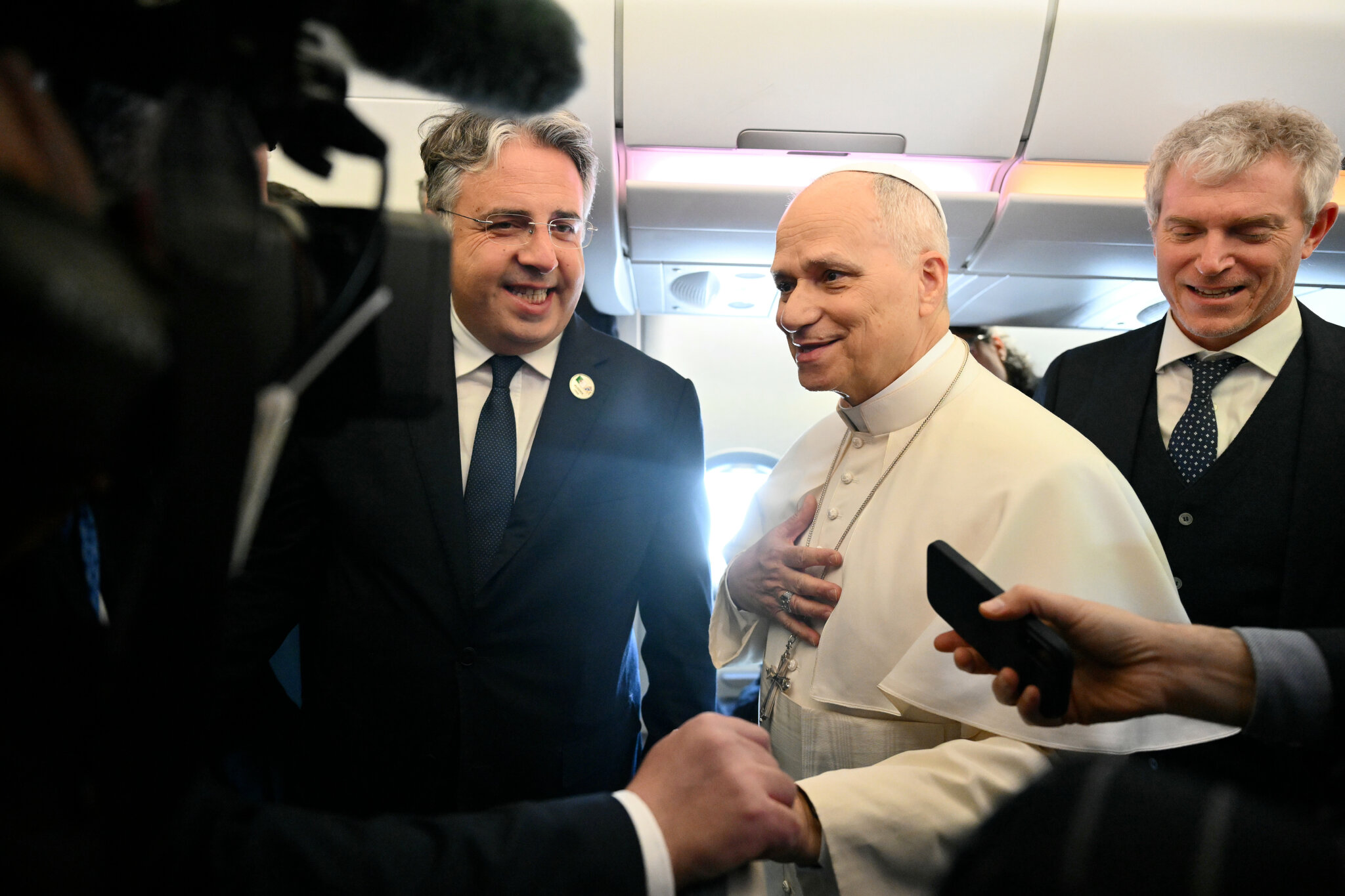 Getting the Pope to Answer a Pointed Question at 30,000 Feet