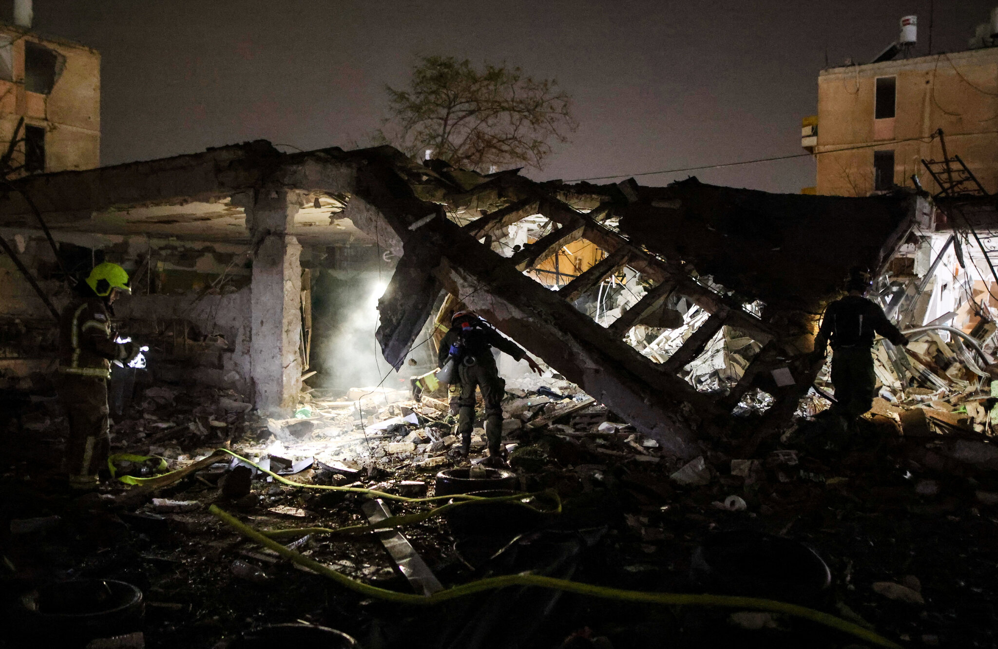 Iranian missile strikes Israeli city near main nuclear research facility.