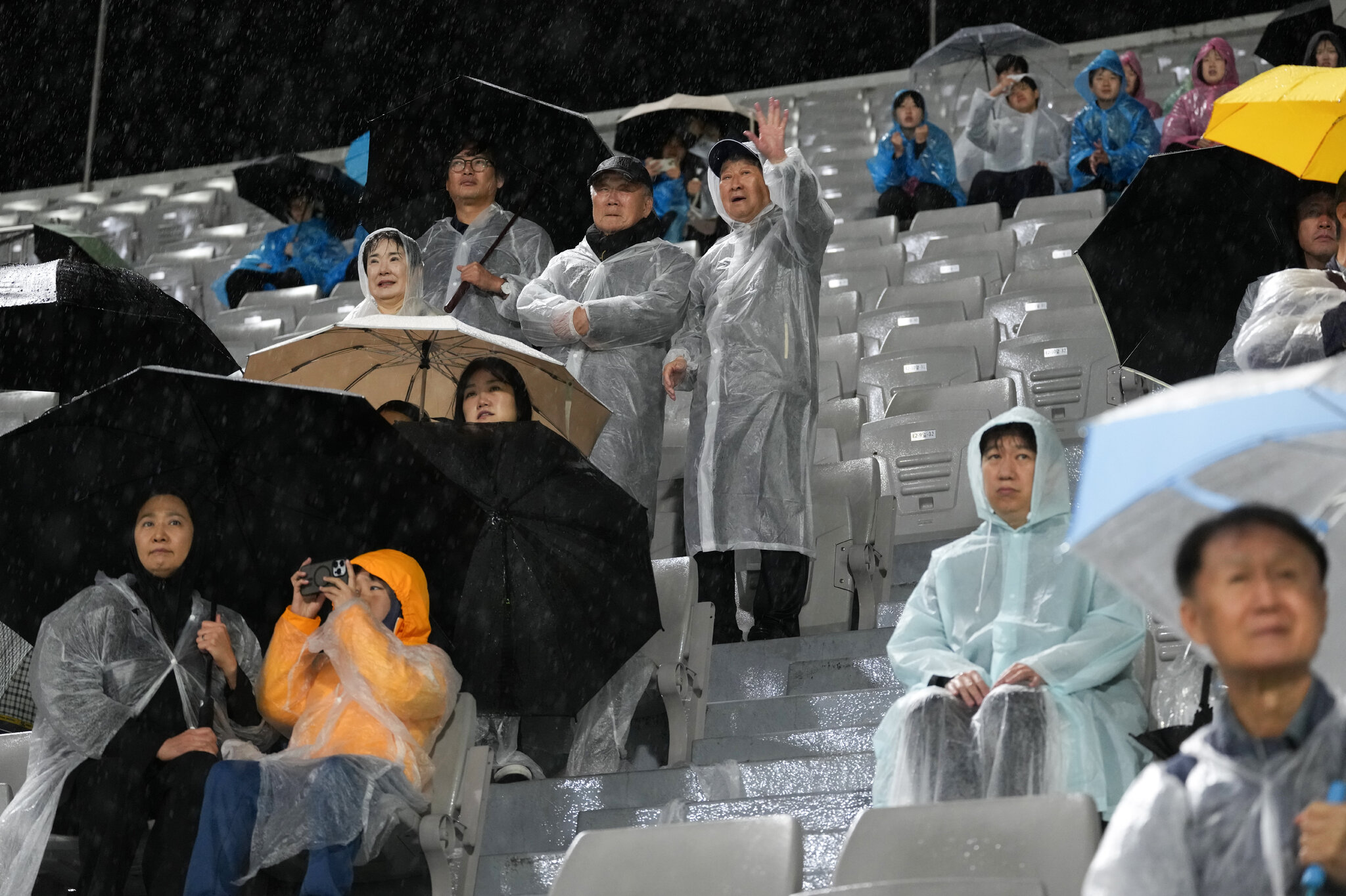 The South Koreans Cheering for a Visiting North Korean Soccer Team