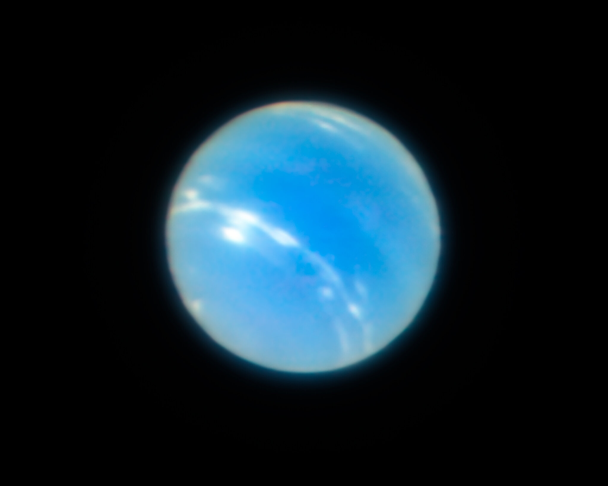 This Moon of Neptune Might Have Survived a Wrecking-Ball Event