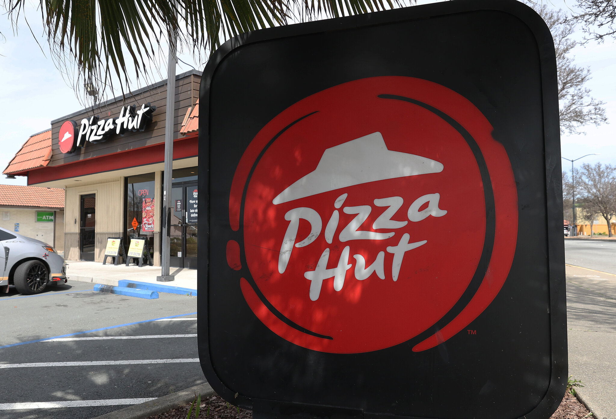 Pizza Hut Sold to Two Firms for $2.7 Billion