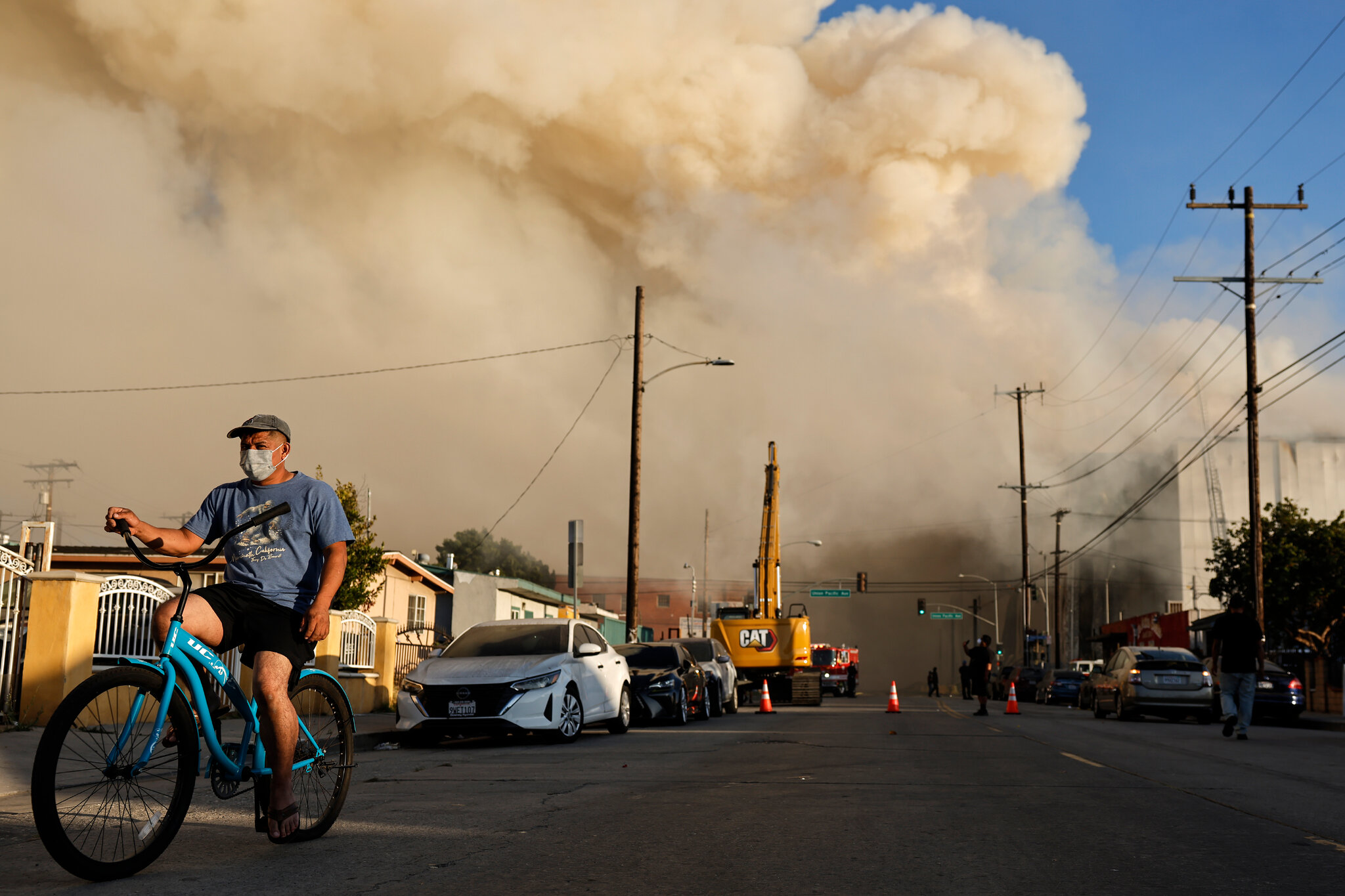 Warehouse Fire in L.A. Still Burns, Spreading Smoke Across Region