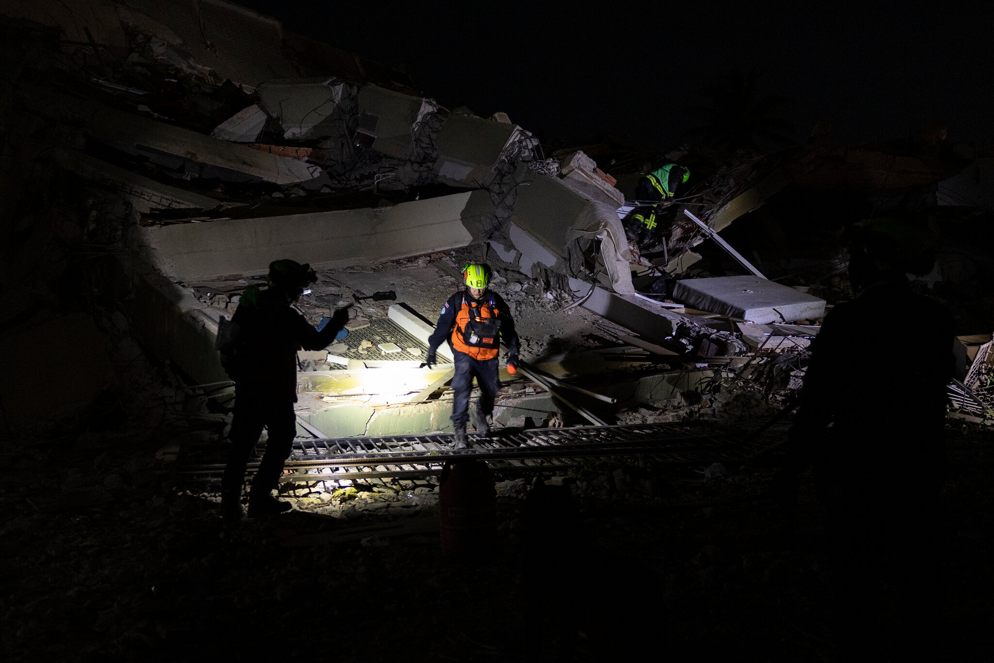 Foreign rescuers in Venezuela battle debris, scarcity of supplies and time.