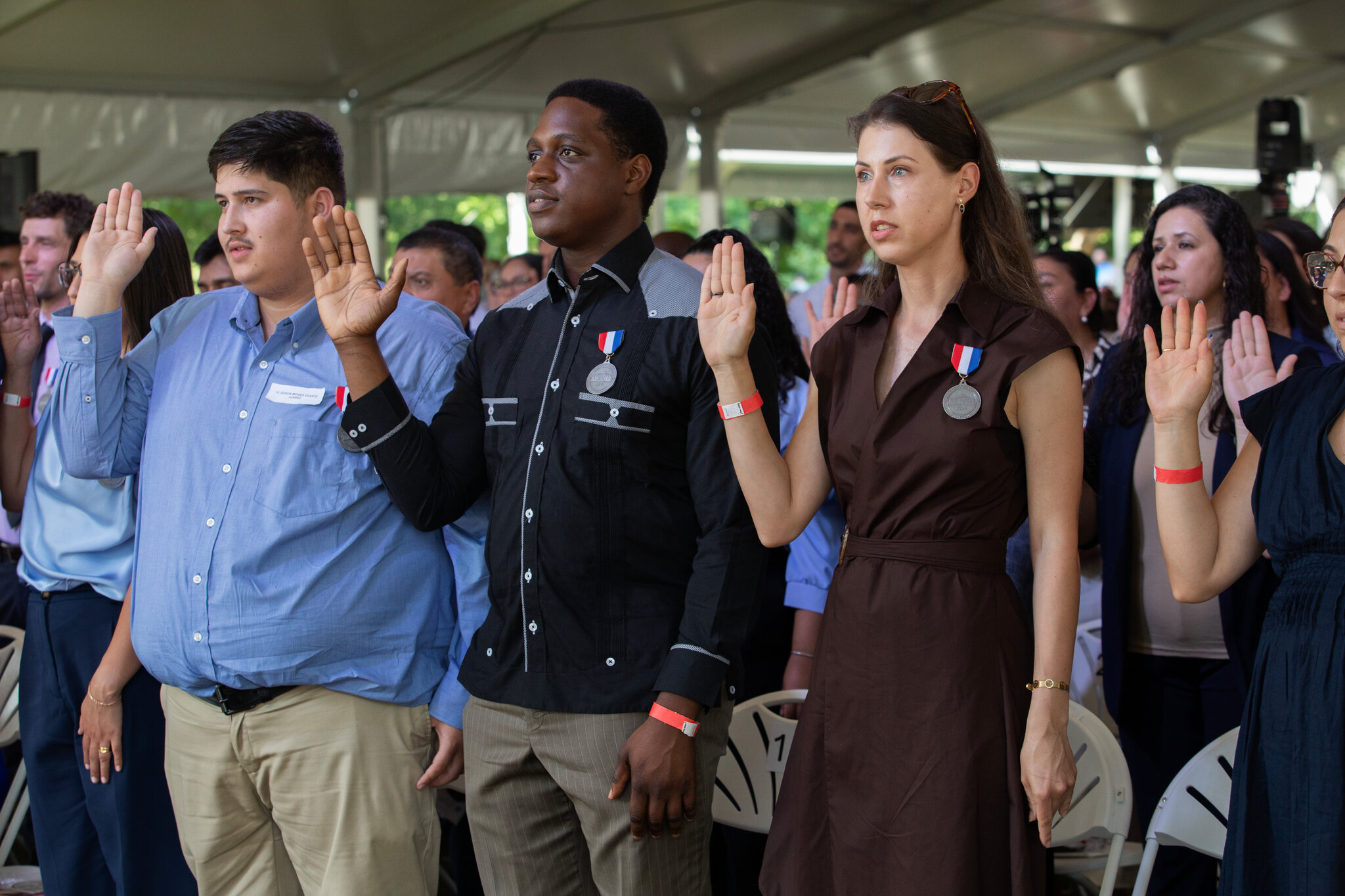 For new citizens, it’s about having their voices heard. And about pizza.