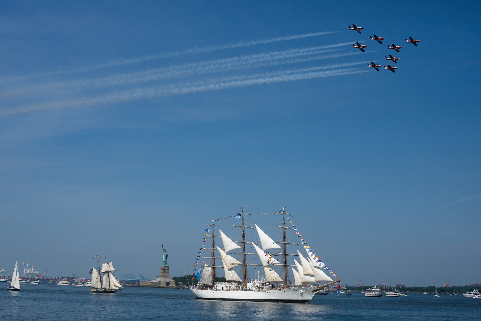 At the tall ships parade, a historic bell rings out.