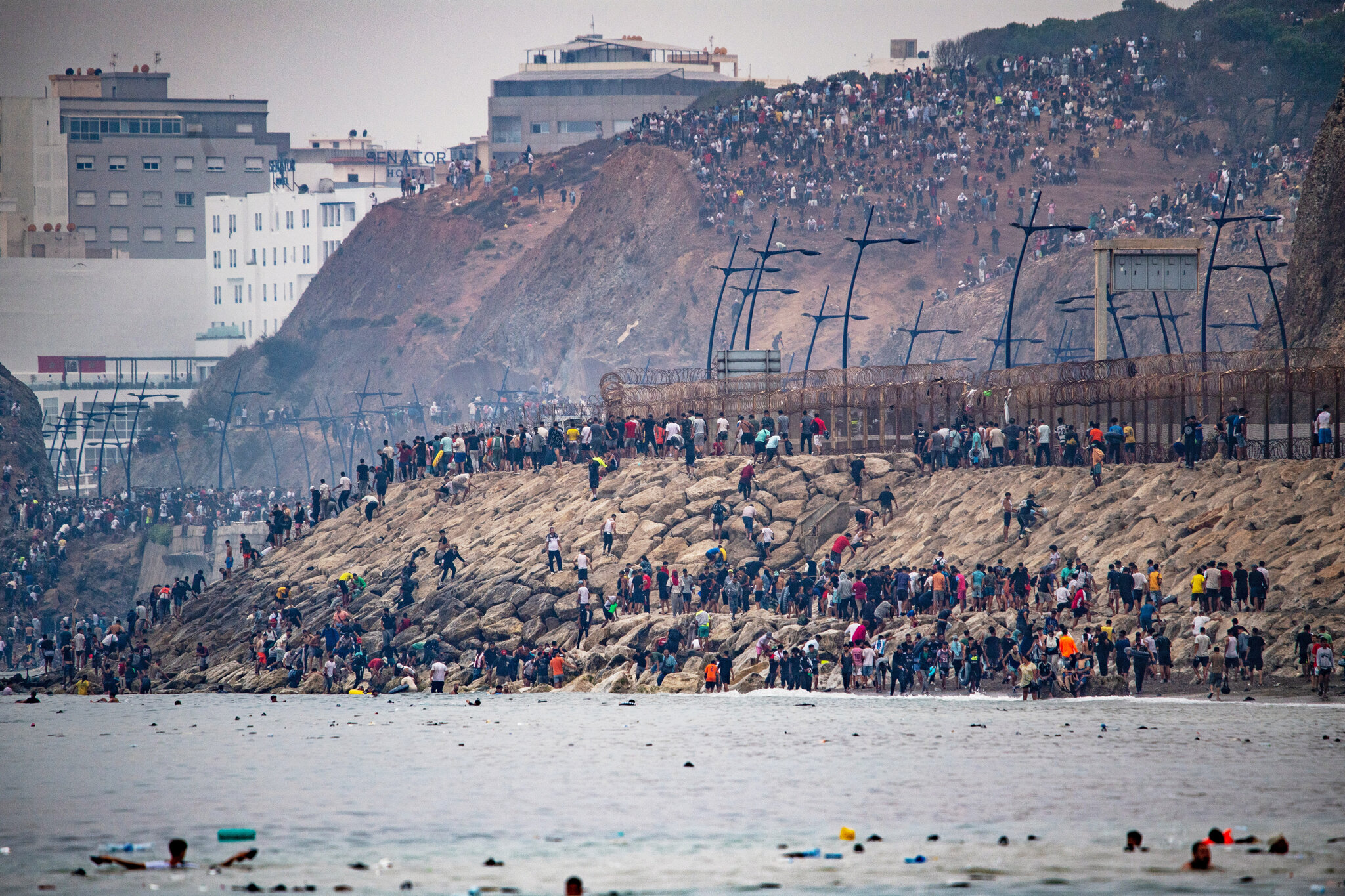 Migrants Surge Into Spanish Territory, Prompting Political Backlash