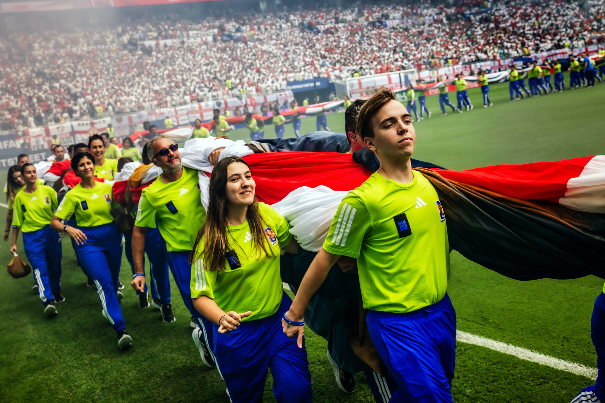 It Takes Coordination (and Many Arms) to Unfurl a World Cup Flag
